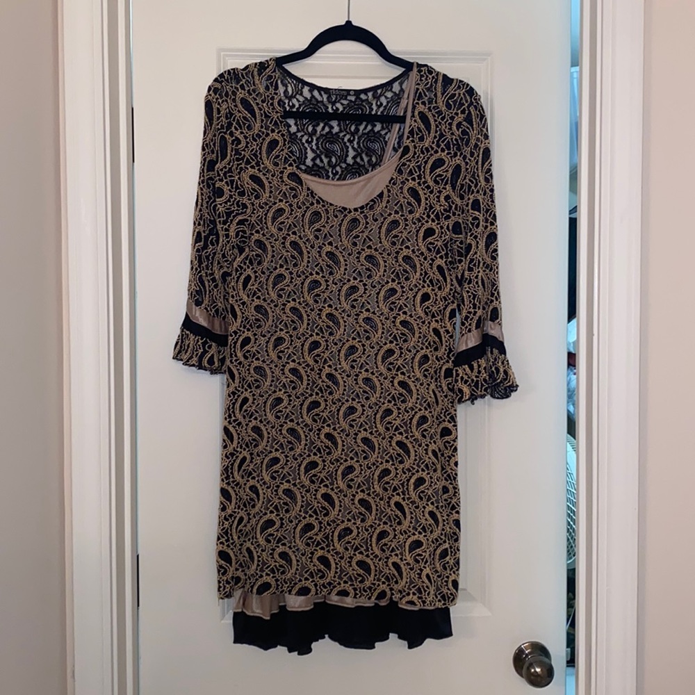 Like new lace dress with ruffled slip.
